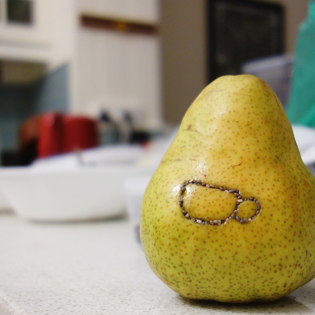 57: Shape of teacup with handle made from chia seeds pressed into a green pear