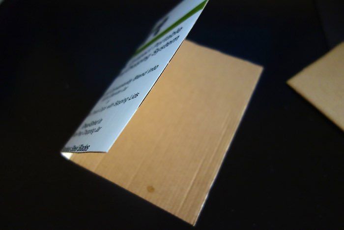 cardboard folded like a book cover