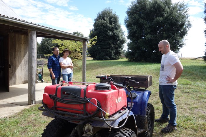 a quad bike with a farm-made box