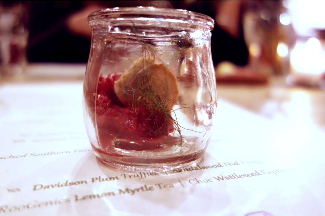 Plum sorbet in a glass pot